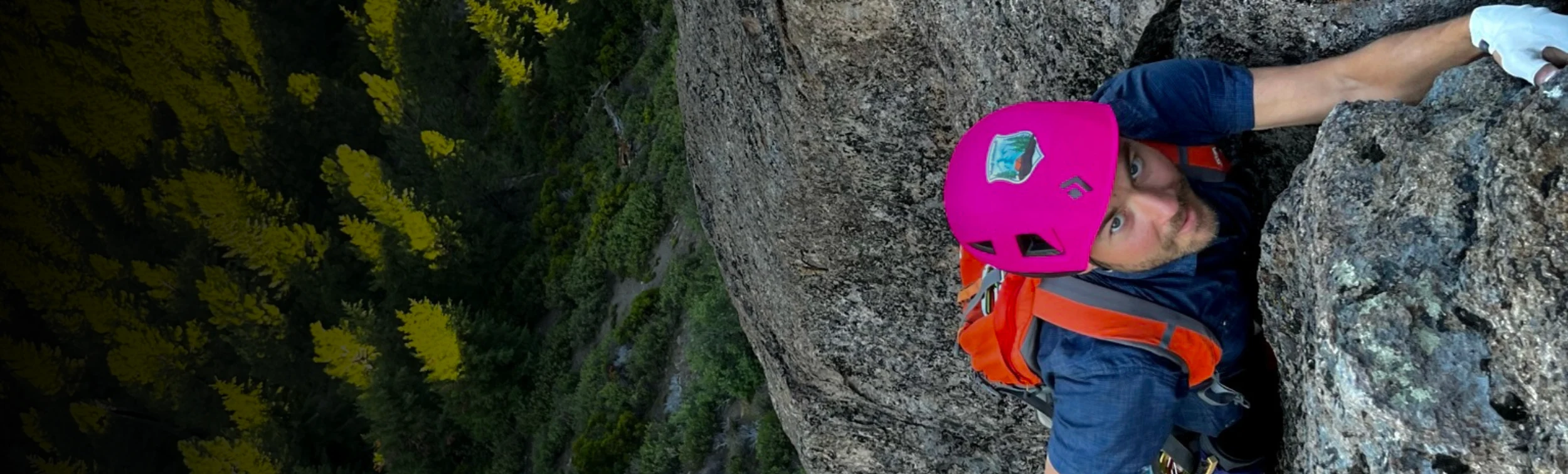 A climber on Cougar Buttress above the Deschutes National Forest.
